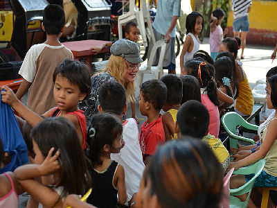Pastor Bev Sumrall with children, Manila, Philippines